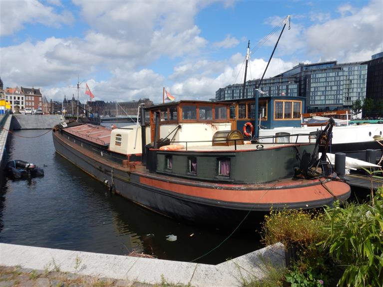 Taxatie woonschip Prins Hendrikkade Amsterdam